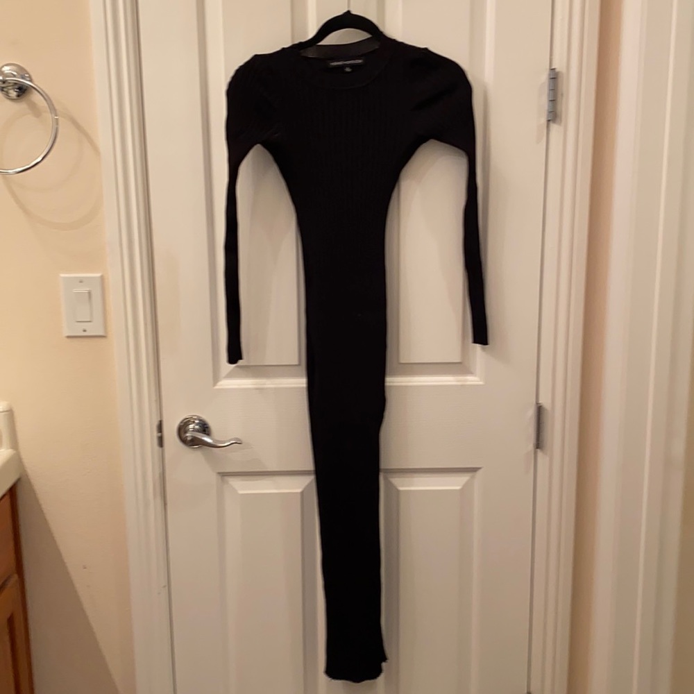 Black maxi length ribbed sweater dress.